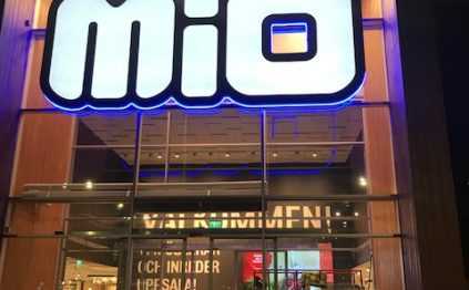 MIO flexfront illuminated logo with neonflex blue line